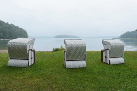 Lakeshore with beach chairs in the morning