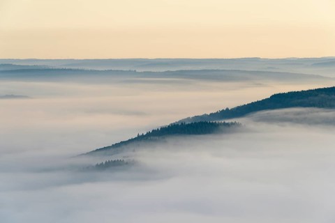 View from Katzenbuckel mountain with morning mist