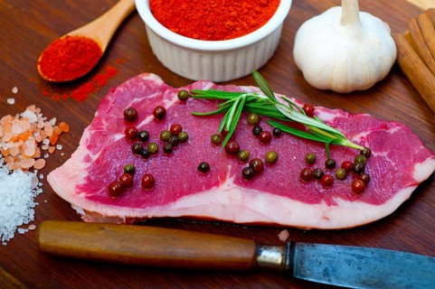 Raw uncooked ribeye beef steak butcher selection