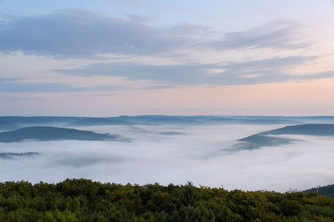 View from Katzenbuckel mountain with morning mist