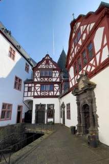 View from castle courtyard to buildings of Trier castle in double castle Buerresheim from the Middle Ages