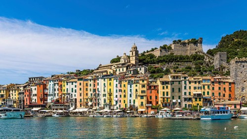 Pastel-coloured house facades in the harbour of Portovenere