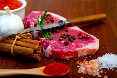 Raw uncooked ribeye beef steak butcher selection