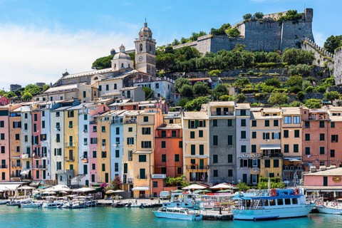 Pastel-coloured house facades in the harbour of Portovenere