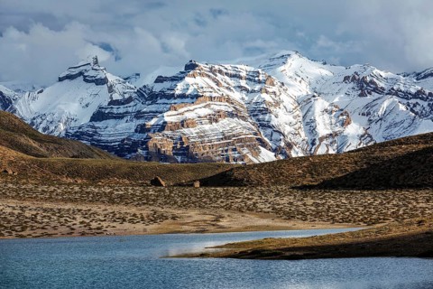 Himalayas mountains and mountain lake Dhankar Lake. Spiti Valley