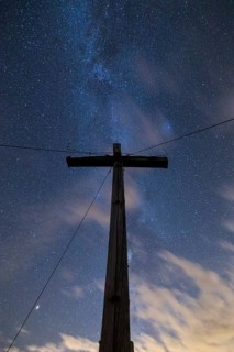 Milky Way above the summit cross of Portlakopf