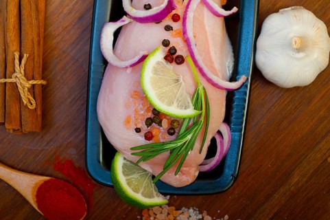 Fresh organic chicken breast with herbs and spices