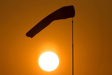 Evening sun with windsock