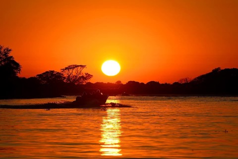 Tourist boat on the Rio Sao Lourenco at sunrise