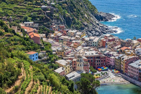 The village of Vernazza with its pastel-coloured houses built into the hillside