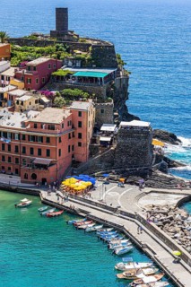 The village of Vernazza with its pastel-coloured houses built into the hillside