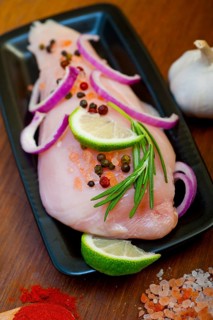 Fresh organic chicken breast with herbs and spices