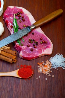 Raw uncooked ribeye beef steak butcher selection