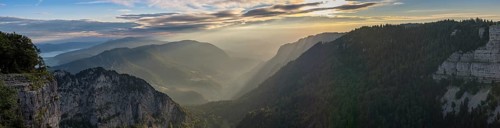 Morning atmosphere over the Val de Travers from the edge of the rocky basin at the Creux du Van