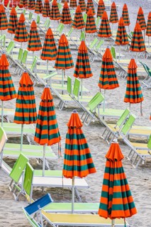 Sunbeds and umbrellas at the beach di Fegina in Monterosso al Mare