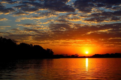Sunrise with clouds over the Rio Sao Lourenco