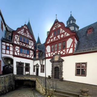 View from castle courtyard to buildings of Trier castle in double castle Buerresheim from the Middle Ages