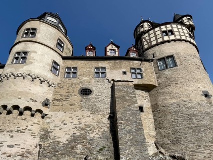 View of towers of Trier castle in double castle Buerresheim from Middle Ages
