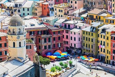 The village of Vernazza with its nested pastel-coloured houses built into the hillside