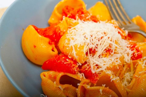 Italian snail lumaconi pasta with ripe cherry tomatoes sauce ingredients