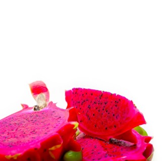Fresh thai purple dragon fruit over white rustic table