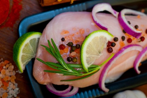 Fresh organic chicken breast with herbs and spices