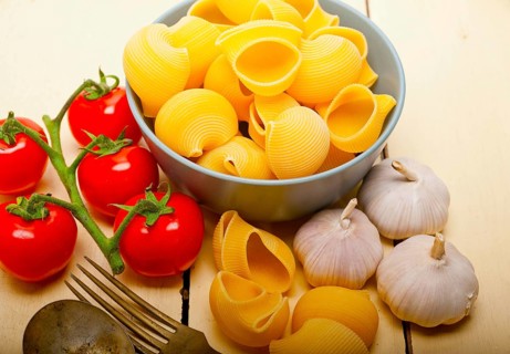 Italian snail lumaconi pasta with ripe cherry tomatoes sauce ingredients