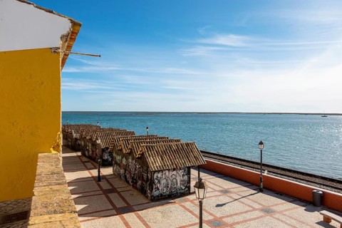 Beautiful view of Ria Formosa and fishermen's wooden storage in Faro
