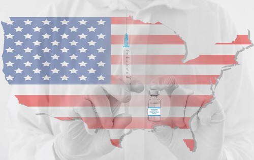 Doctor hands holding a vaccine bottle and syringe