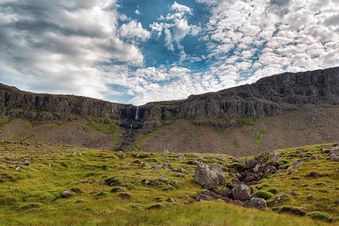 Small waterfall on high cliffs