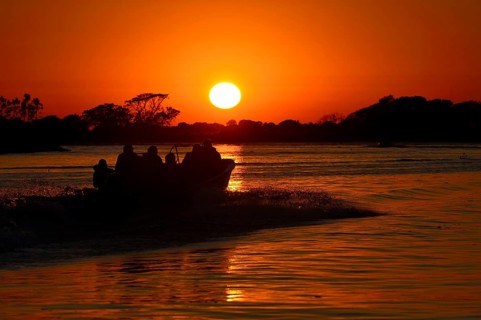 Tourist boat on the Rio Sao Lourenco at sunrise
