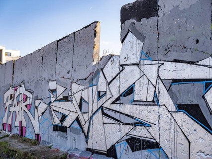 Graffiti on wall remains behind the Urban Gardening project at a new development area at the Old Harbour