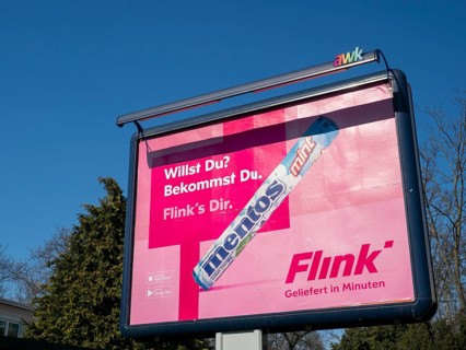 Advertising poster of the delivery service Flink