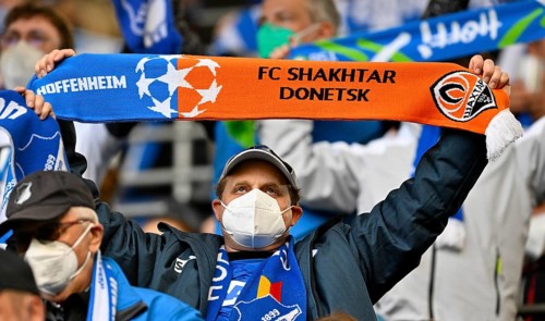 Hoffenheim fan with combined fan scarf FC Shakhtar Donetsk