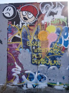 Graffiti on wall remains behind the Urban Gardening project at a new development area at the Old Harbour