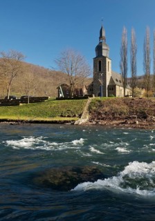 The River Lenne with the Church of St. Joseph in Nachrodt