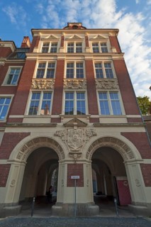Main facade of the primary school with the old city coat of arms of Goerlitz