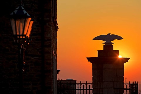 Sunset behind the portal of Bensberg Castle