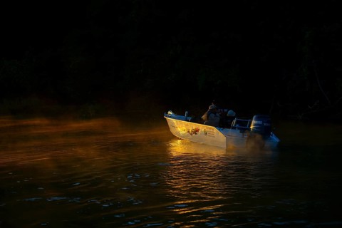 Tourist boat on the Rio Sao Lourenco at sunrise