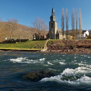 The River Lenne with the Church of St. Joseph in Nachrodt