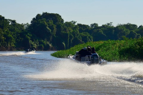 Motorboats with tourists on the Rio Sao Lourenco