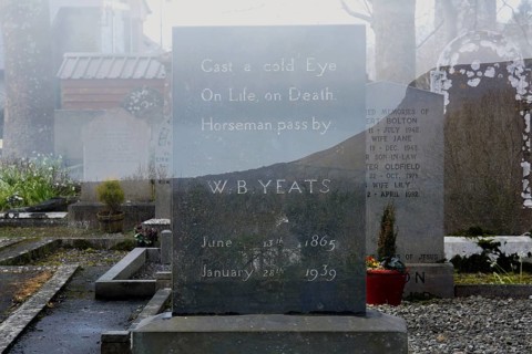 Double exposure of W. B. Yeats gravestone at Drumcliff graveyard underneath Ben Bulben mountain. Sligo