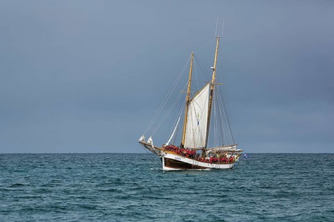 Sailing boat with tourists in summer