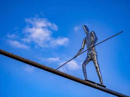 Stainless steel sculpture 'Walking Man' by the Frankfurt artist E. R. Nele above Friedberger Strasse