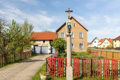 Wayside shrine in front of a residential house
