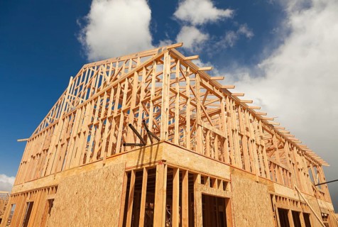 Abstract of wood home framing at construction site