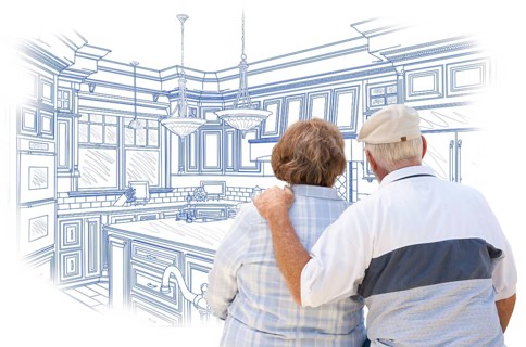 Curious senior couple looking over blue custom kitchen design drawing