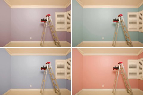 Set of empty rooms painted in variety of colors with ladder