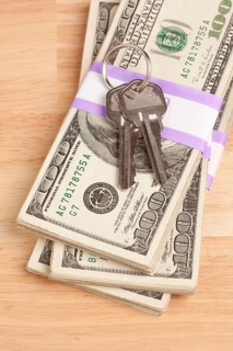 House keys on stack of money