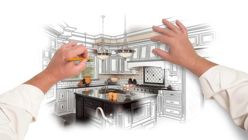 Male hands sketching with pencil A custom kitchen with photo showing through